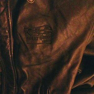 Man's port authority brown leather jacket
